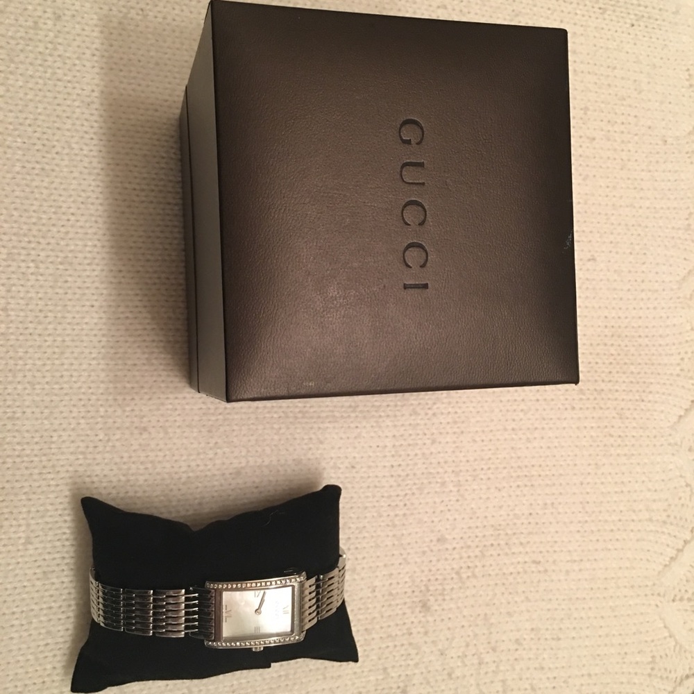 Gucci Watch ( diamonds and mother of pearl)